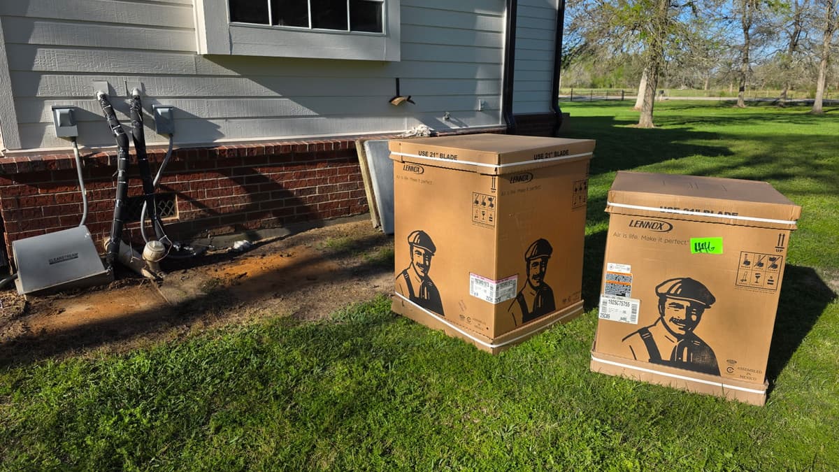 New Lennox air conditioning equipment, still boxed, delivered to a Katy home